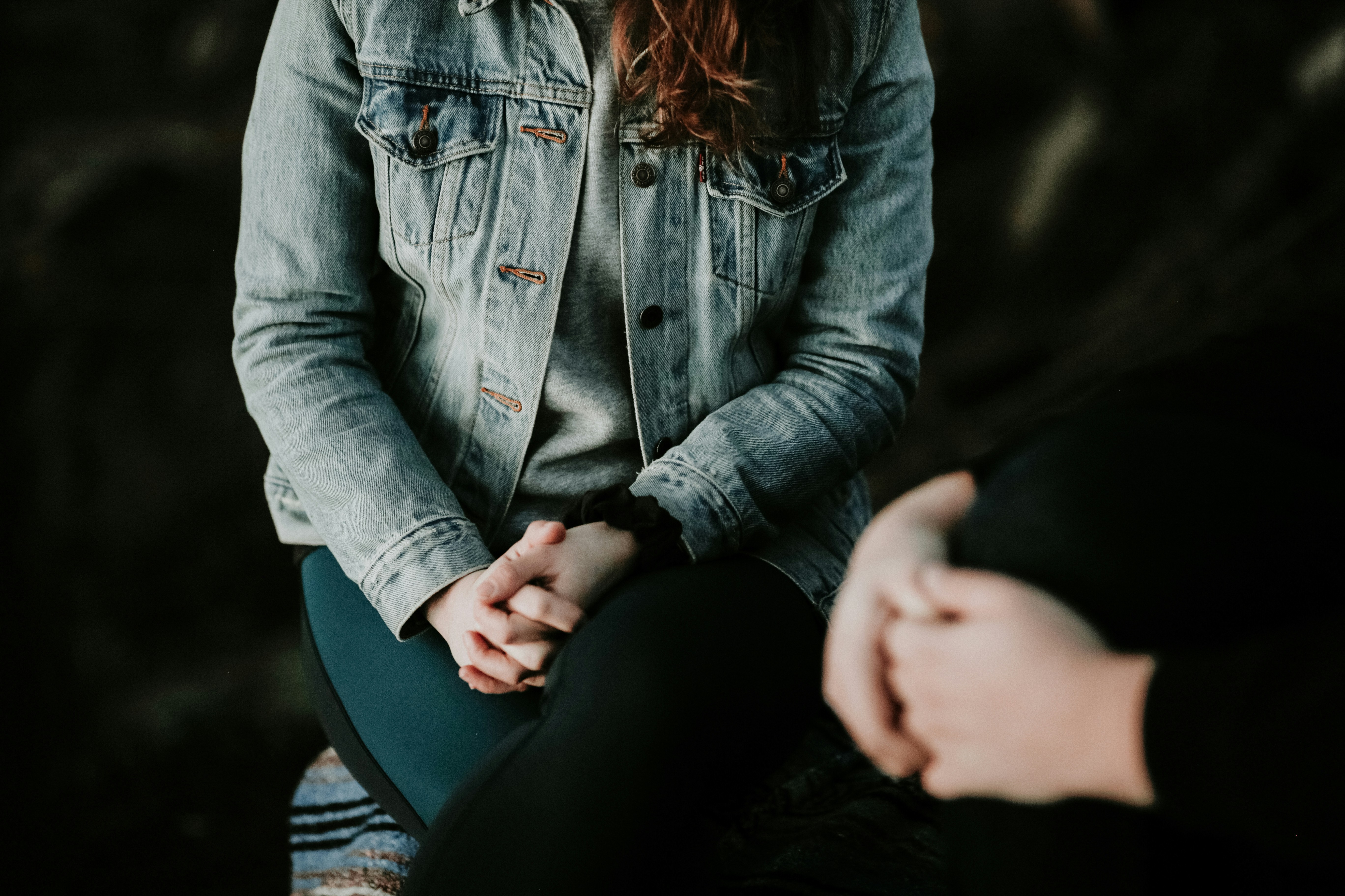 Therapist and client in a warm, sunlit session